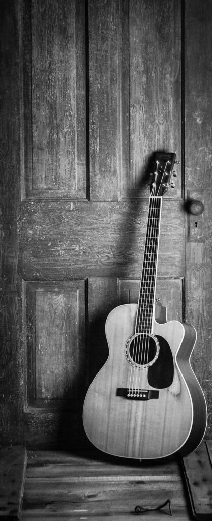 Brown and Black Cut-away Acoustic Guitar